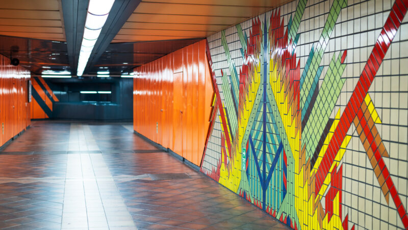 Interior of an underground station in Berlin, Germany. Multicolored walls and no people