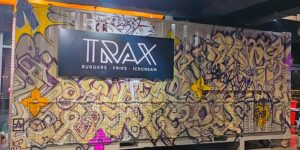 Street Art Magic: Art Smiley Transforms Food Container Trucks into Vibrant Canvases
